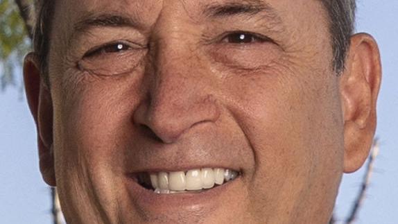 Pima County supervisor candidate accused of violating state law with voter site photo